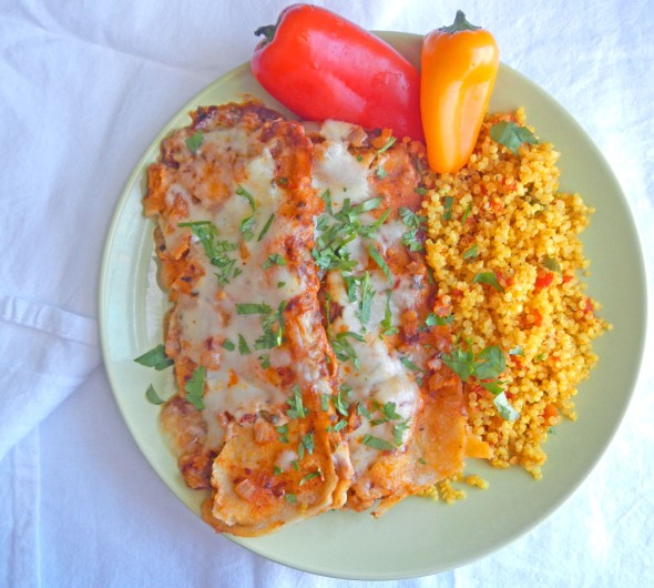These delicious bean and cheese enchiladas will be a hit at any dinner table!